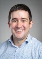 Headshot of Andrew Enzler, a provider who specializes in pediatrics