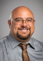 Headshot of Jason Parvis, a provider who specializes in Hospice and Palliative Medicine