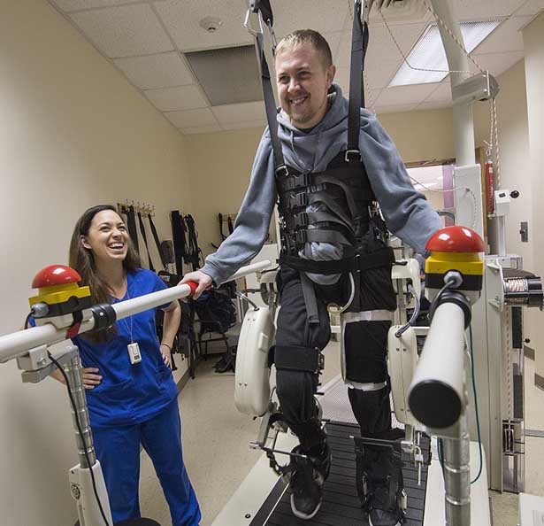 a stroke patient works with gait assist technology