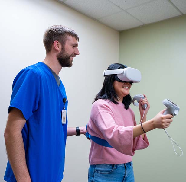 A Courage Kenny Rehabilitation Institute patient uses virtual reality for therapy