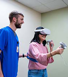 A Courage Kenny Rehabilitation Institute patient uses virtual reality for therapy