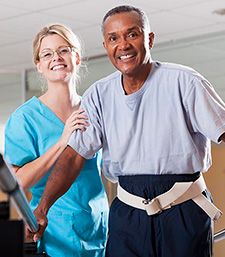 a stroke patient works with a caregiver